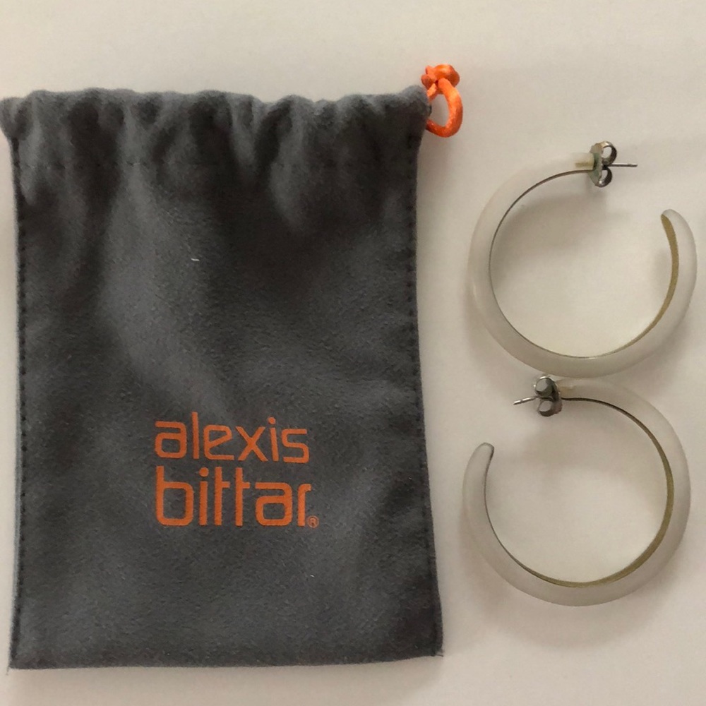 Alexis Bittar hoop earrings.